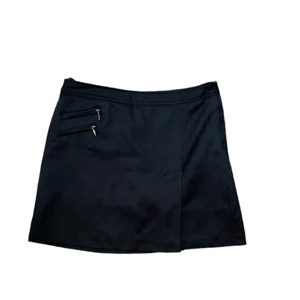 Izod Golf Black Golf Skirt with Shorts Underneath Side Zip Closure Size 10